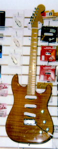 Custom solid 1 piece Flame Maple Strat style 